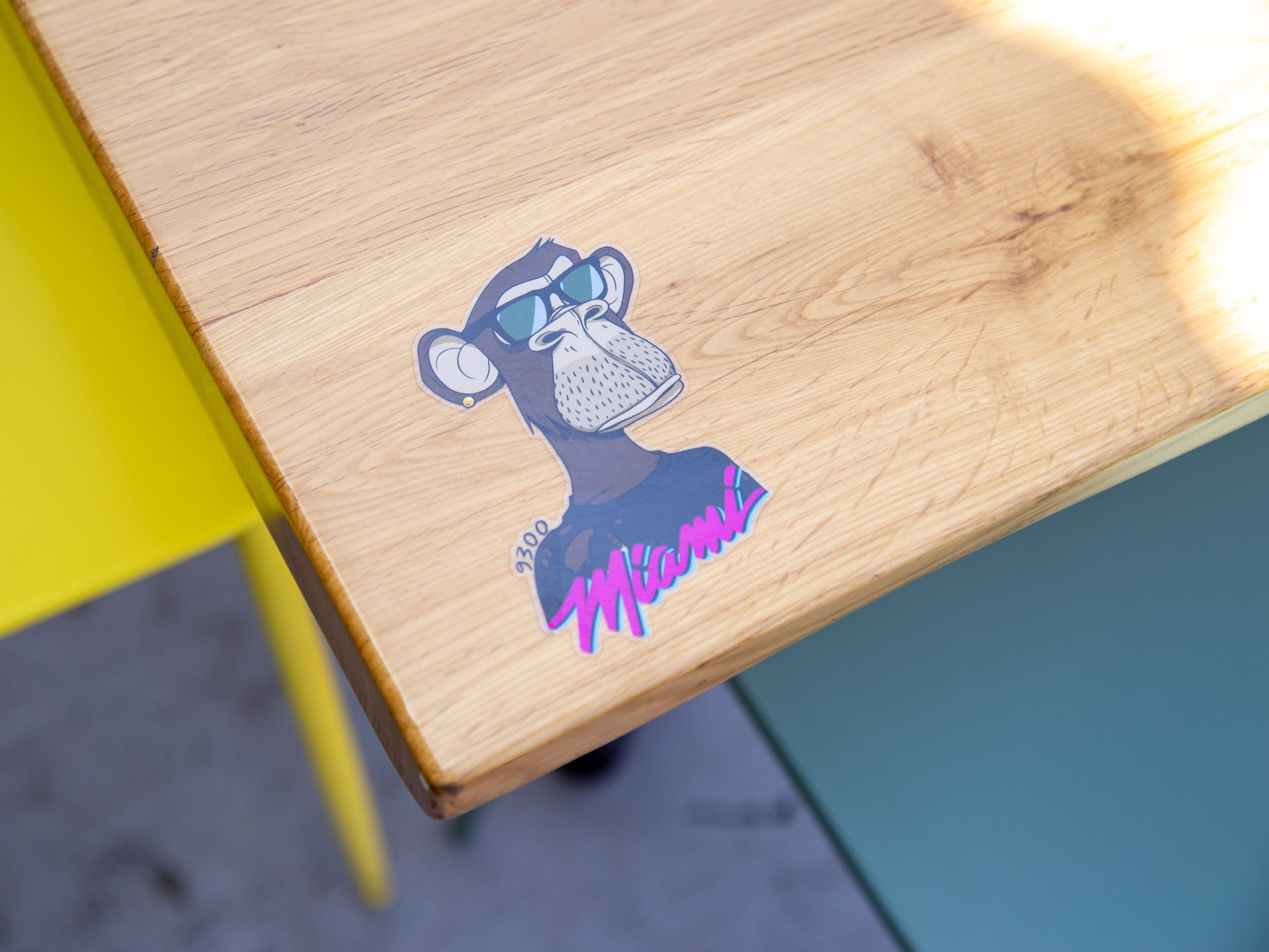 An ape decal on a wooden table.