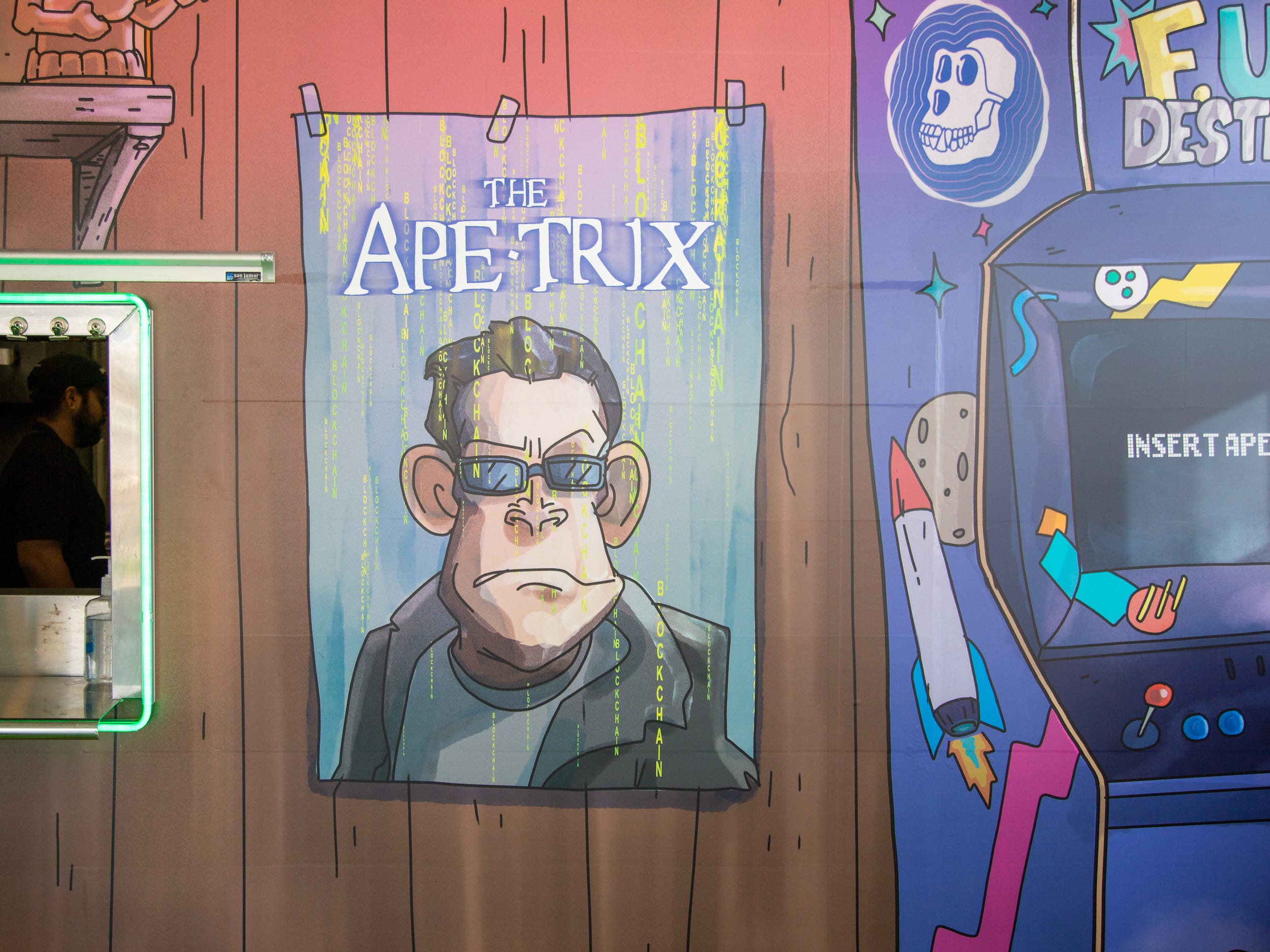 Inside the Bored and Hungry store with a wall decal that reads "The Aptrix."