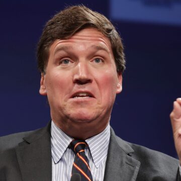 An artist raised $14,000 for abortion rights by selling an image of Tucker Carlson appearing with an unintentionally 'pro-choice' message on Fox News