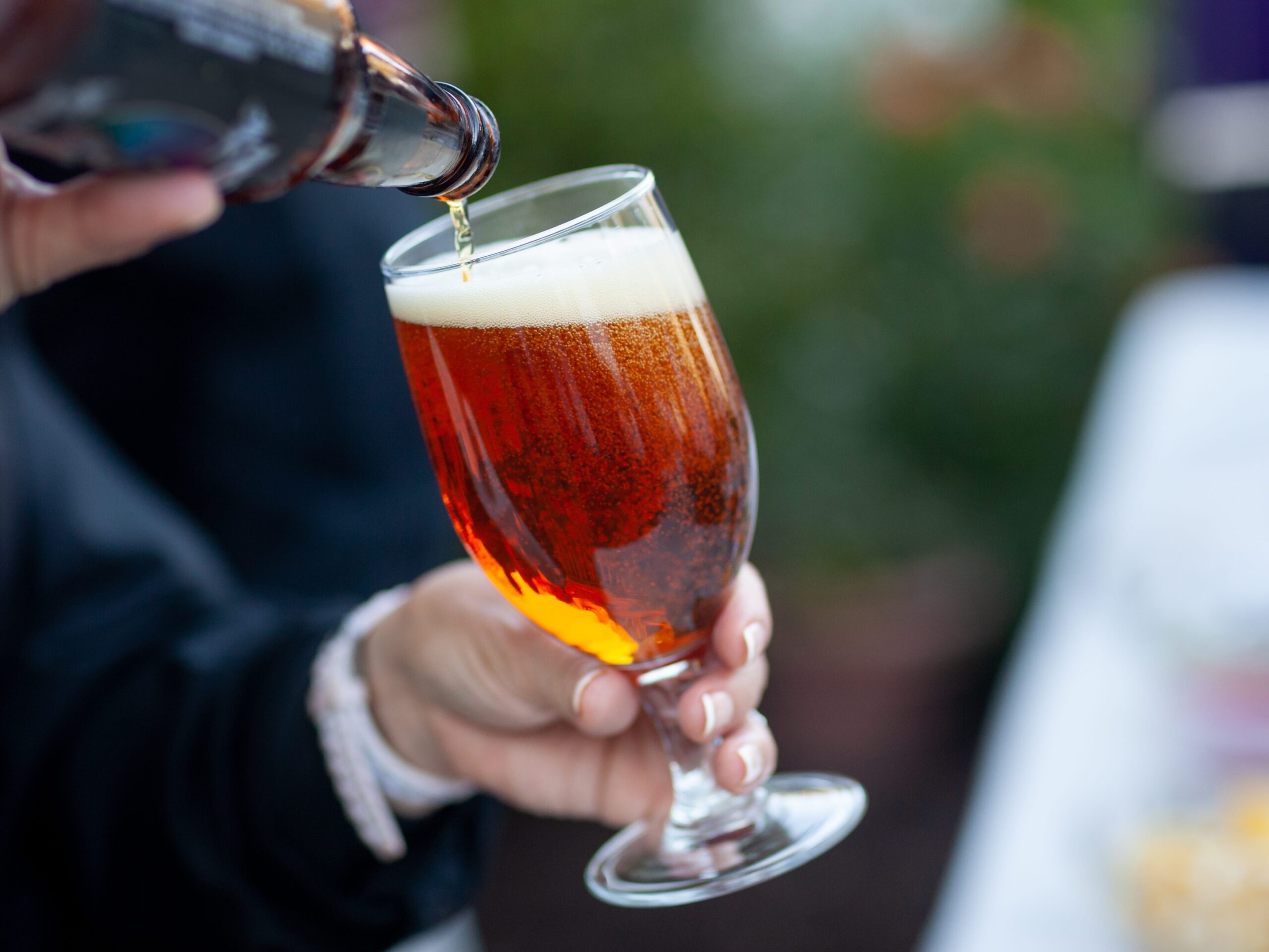 Man pours beer