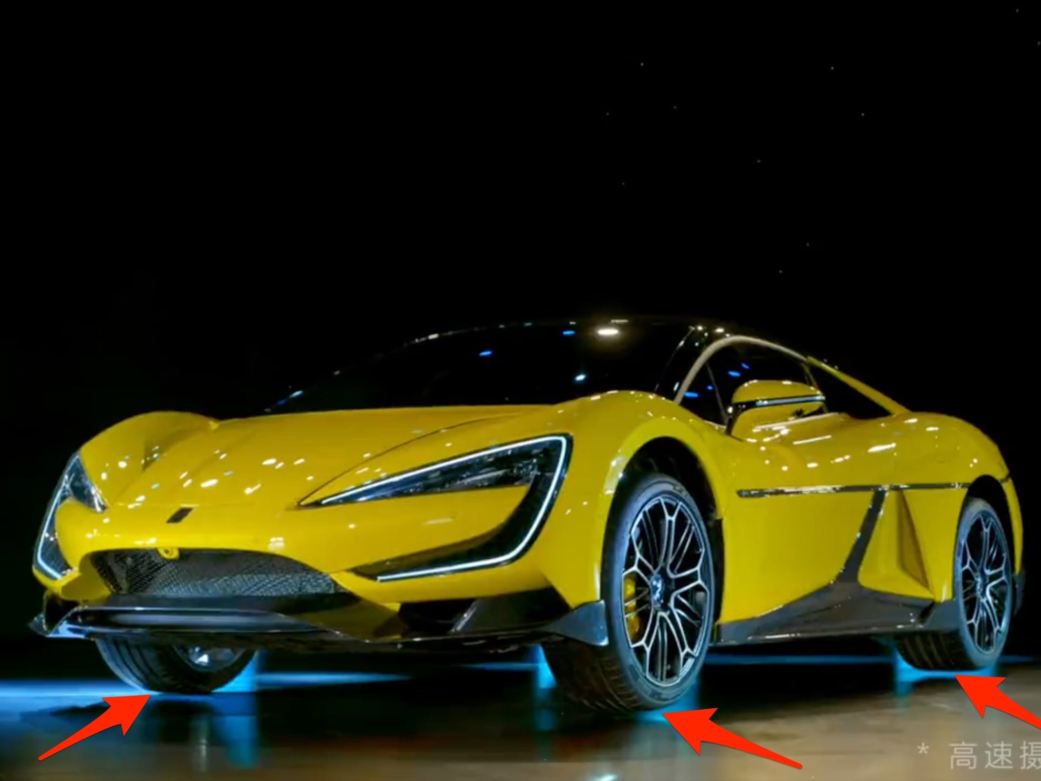 The Yangwang U9 supercar from BYD is shown jumping off the ground.