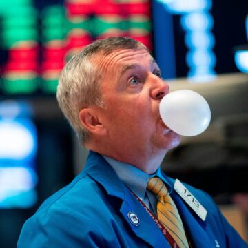 The stock market still looks overvalued even as the ‘everything bubble’ deflates, research firm says