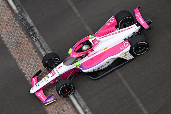 Hot pink, crypto and motorsport together at last