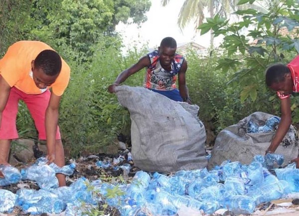 Collecting plastic bottles for tokens. Blockchain environmental cleanup